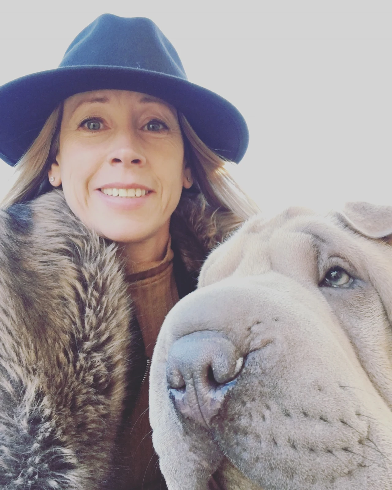 Melanie pictured with a dog on the Albany Active Paws website