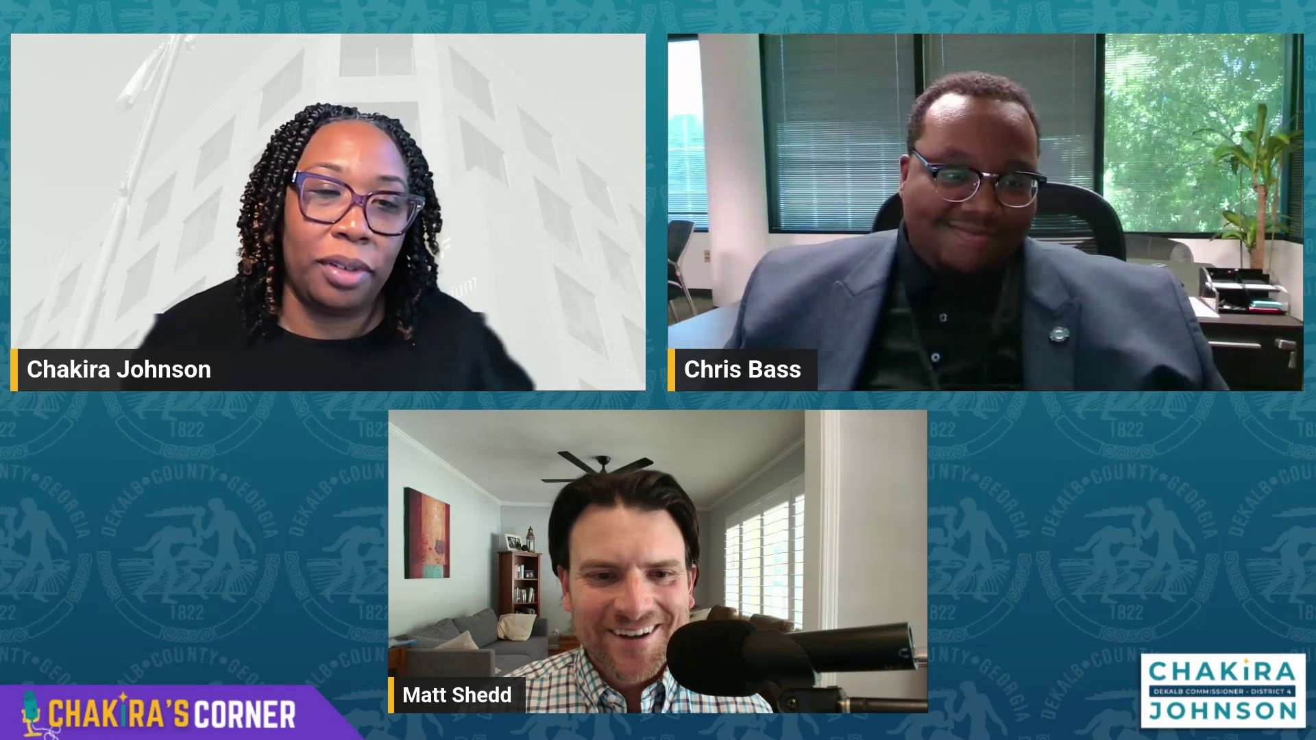 Screenshot from a virtual episode of Chakira’s Corner featuring Commissioner Chakira Johnson, Chris Bass, and host Matt Shedd in a three-person video call layout. Commissioner Johnson appears in the upper left, Chris Bass in the upper right seated in an office, and Matt Shedd at the bottom speaking into a microphone from a home office setting. The background includes DeKalb County branding and the Chakira’s Corner logo.