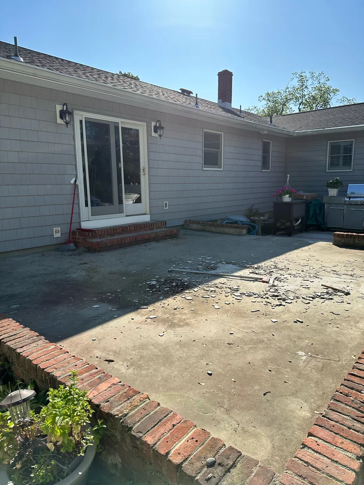 Worn back patio before epoxy resurfacing in Monmouth County, NJ