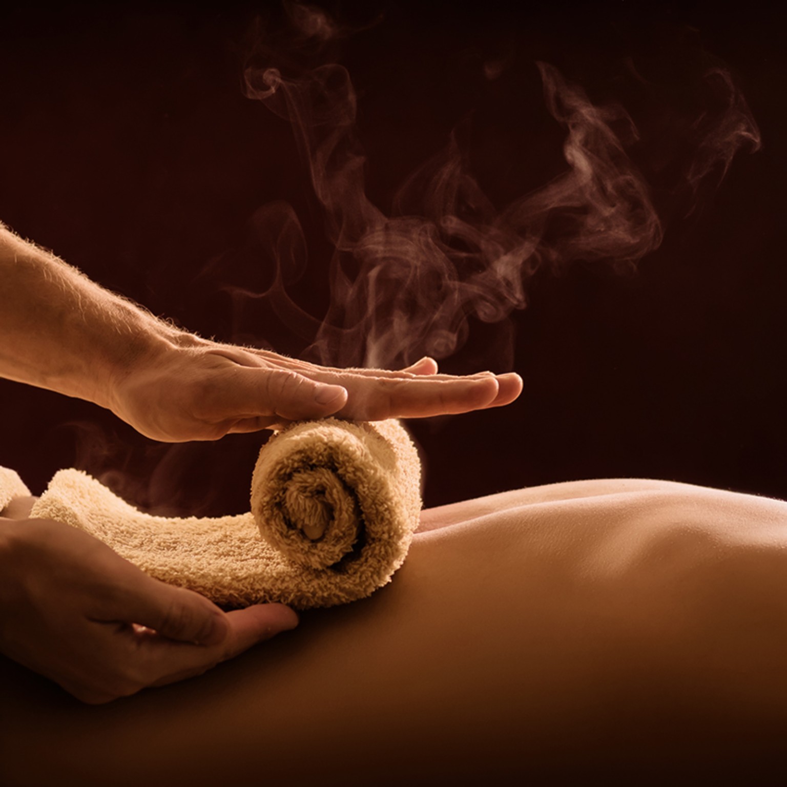 A warm towel treatment during a relaxing spa service