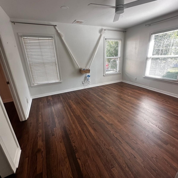 Hardwood floor refinishing Dallas, TX with advanced dustless sanding technology.