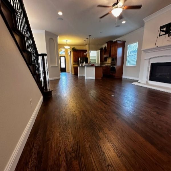 Wide plank hardwood flooring installed in Dallas, TX home with elegant design.