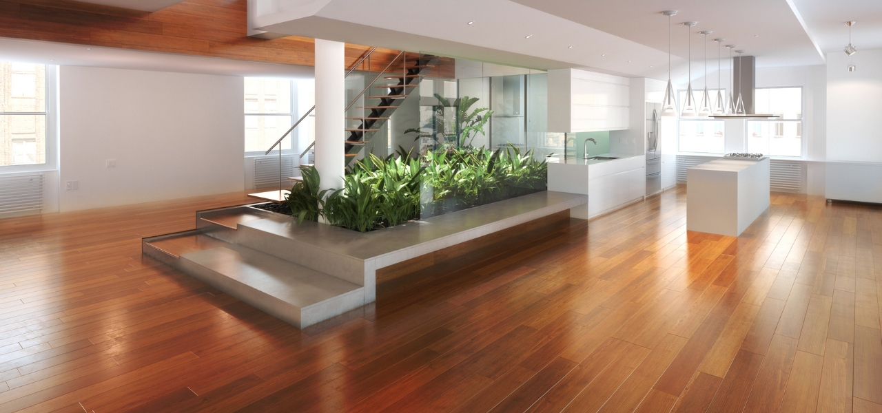 Professional hardwood flooring installation team working in a Dallas, TX home