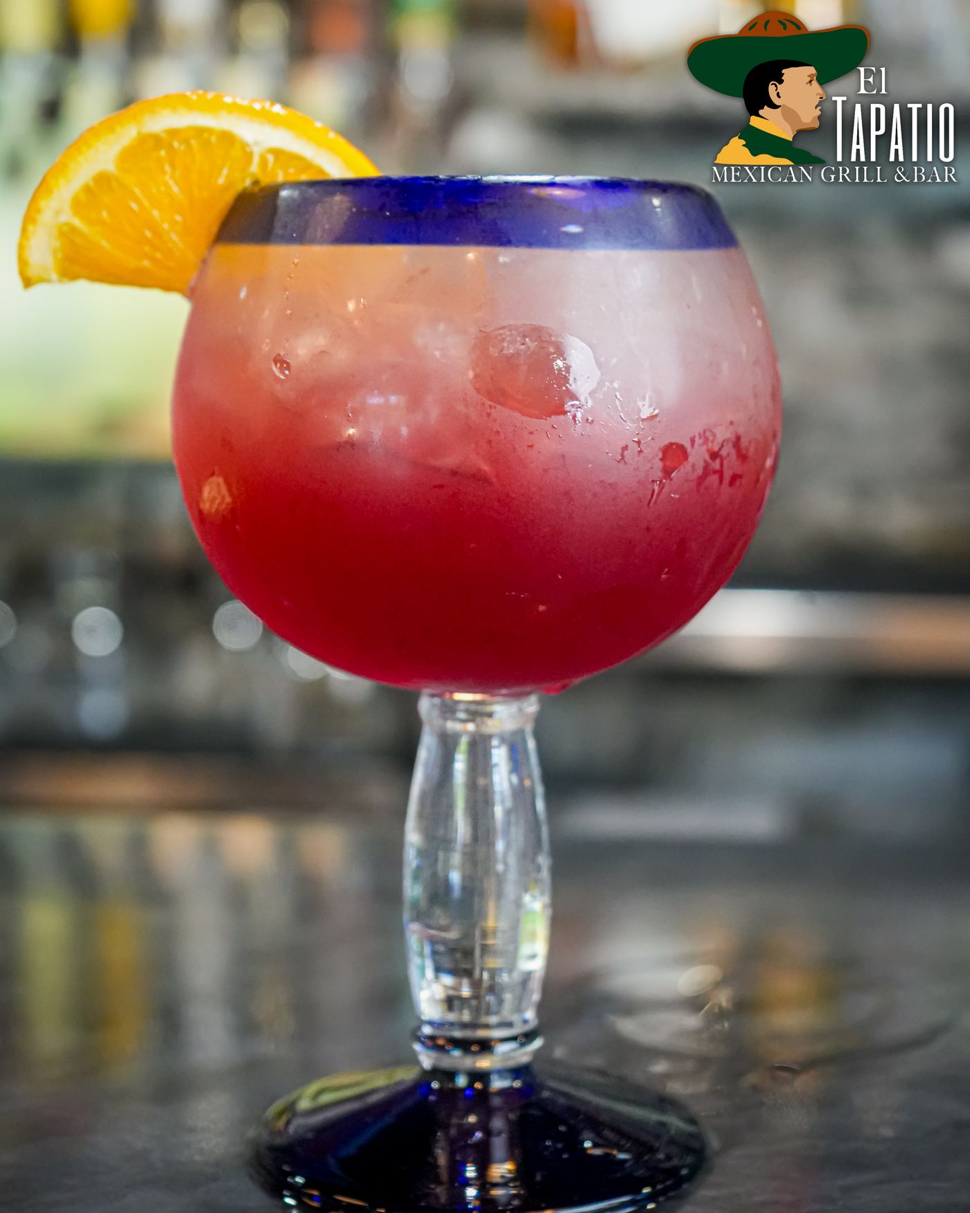 El Tapatio green and blue margaritas side by side