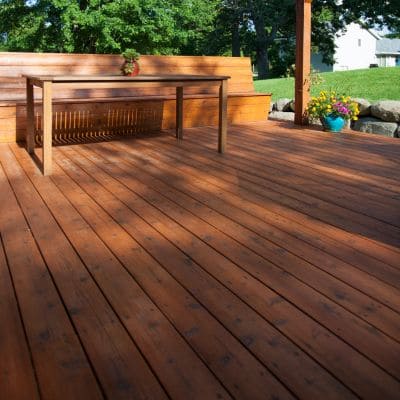 Outdoor wooden deck with built-in bench seating