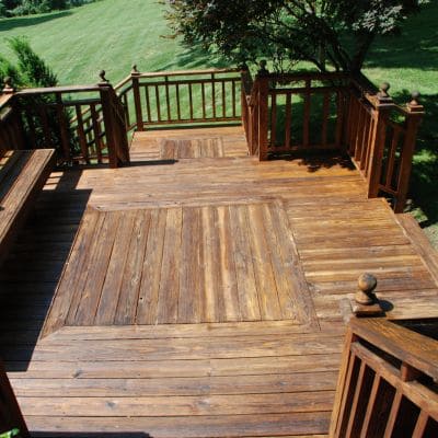 Multi-level wooden deck with natural finish