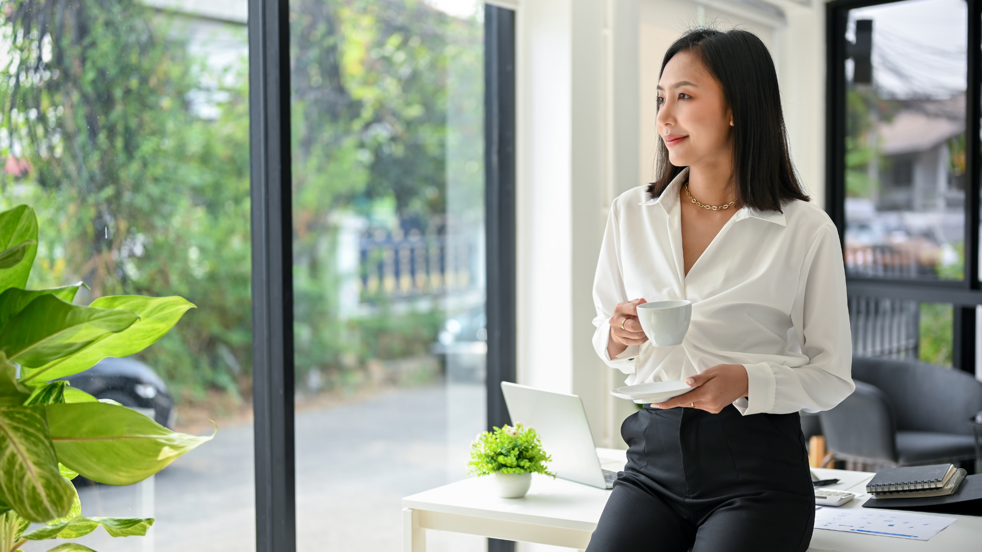 Business owner enjoying the flexibility of being her own boss Business owner enjoying the flexibility of being her own boss