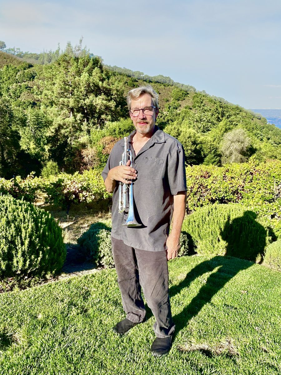 Dave Brigham holding his trumpet