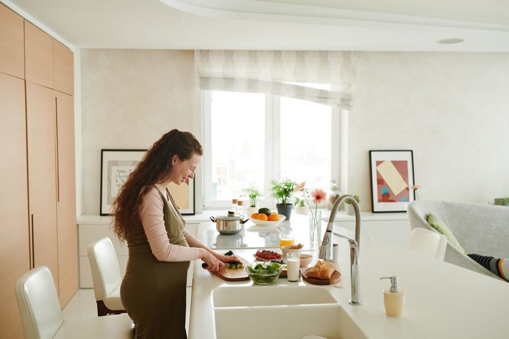 Family preparing a colorful variety of vegetables together in the kitchen
