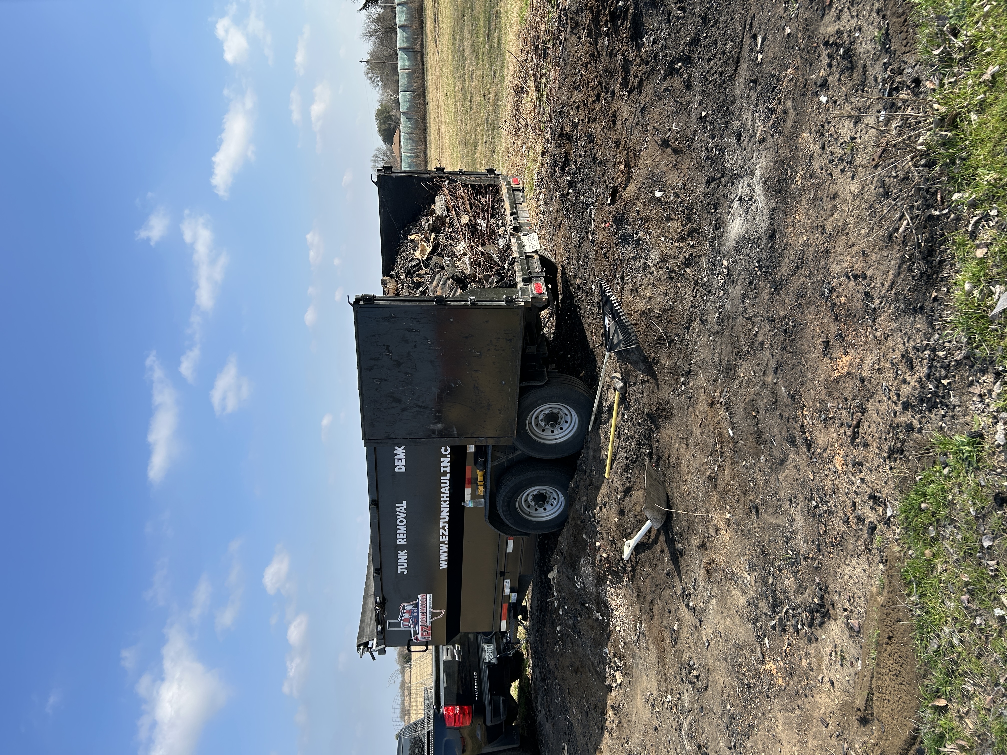 Dump trailer hauling debris for junk removal in Johnson County TX
