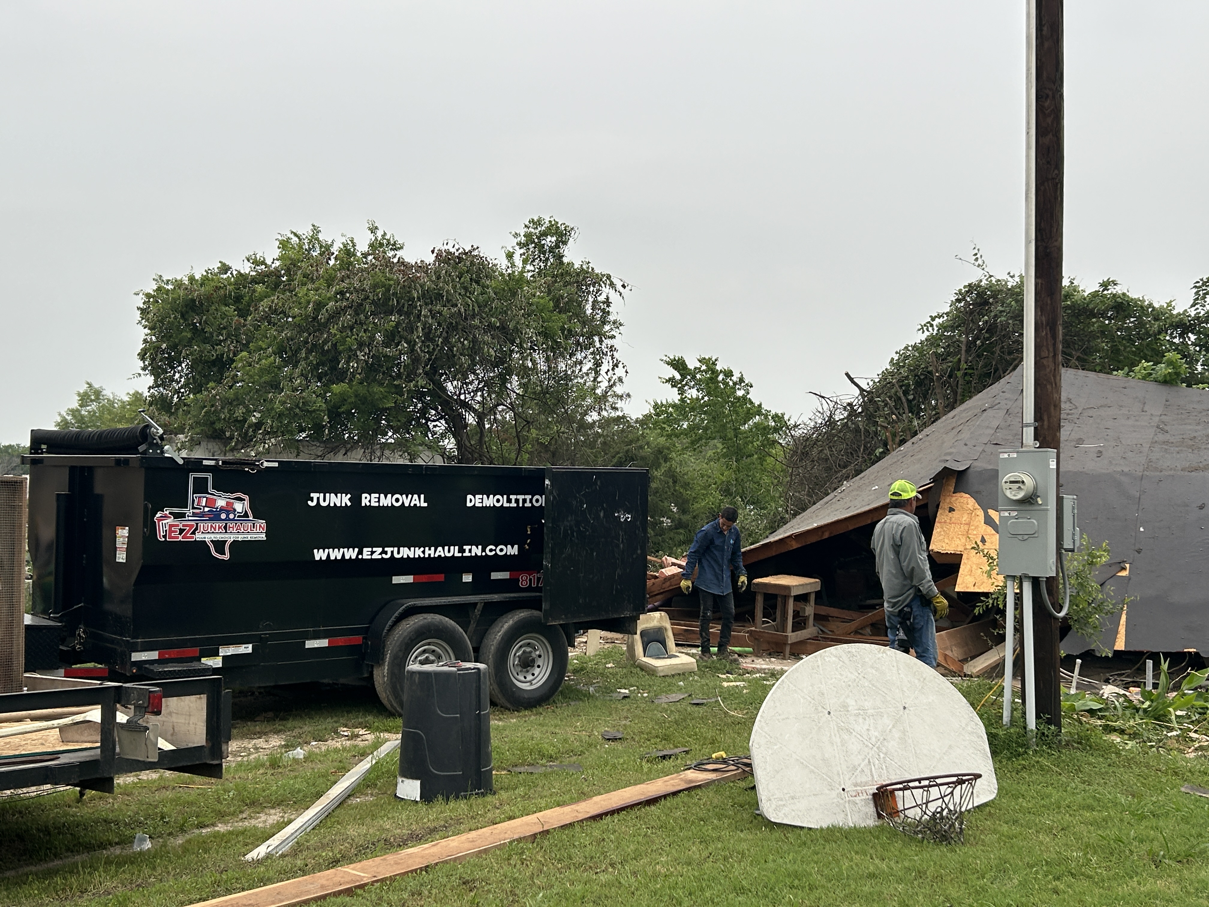 Demolition crew cleanup and construction debris removal
