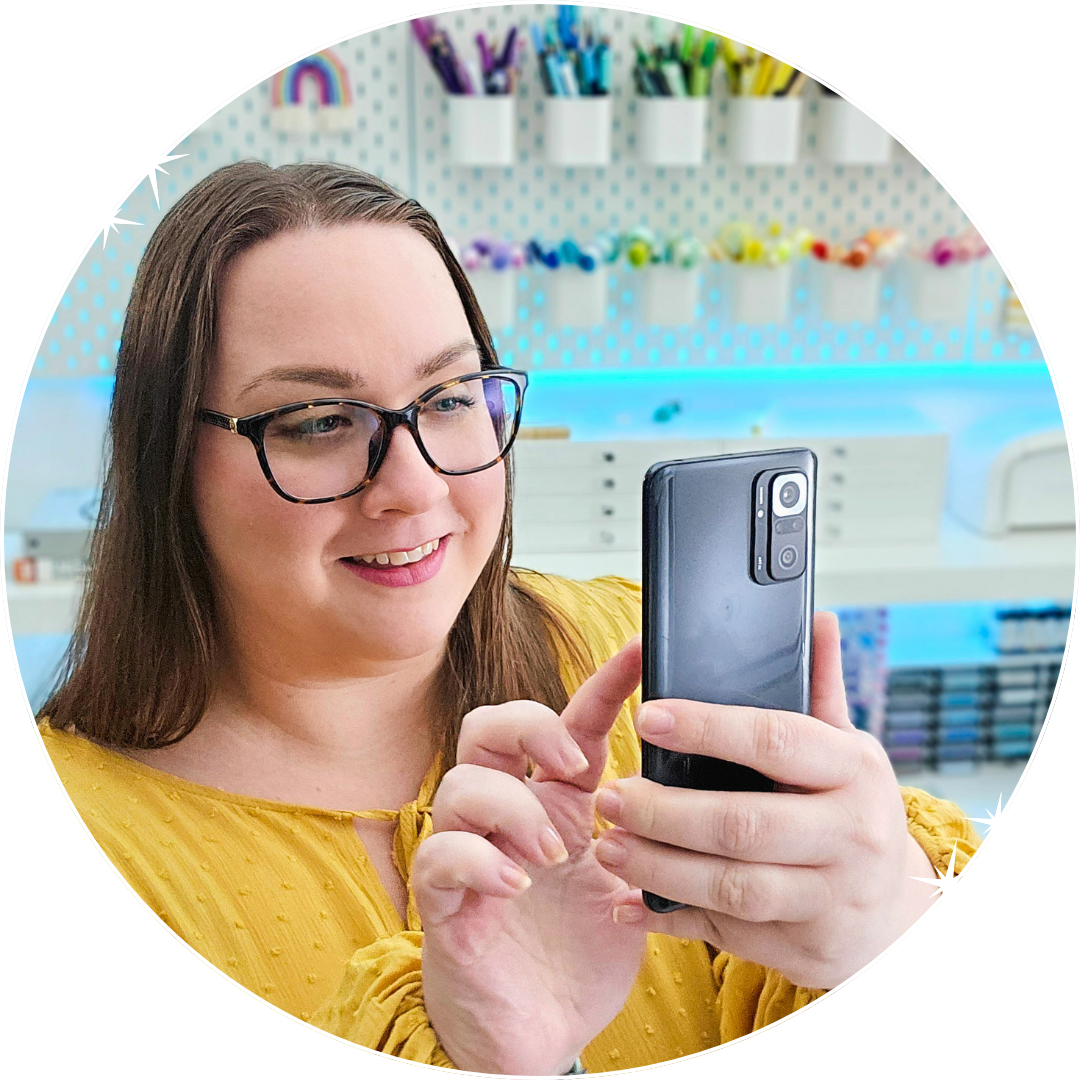 Mona taking scrapbook photos with phone