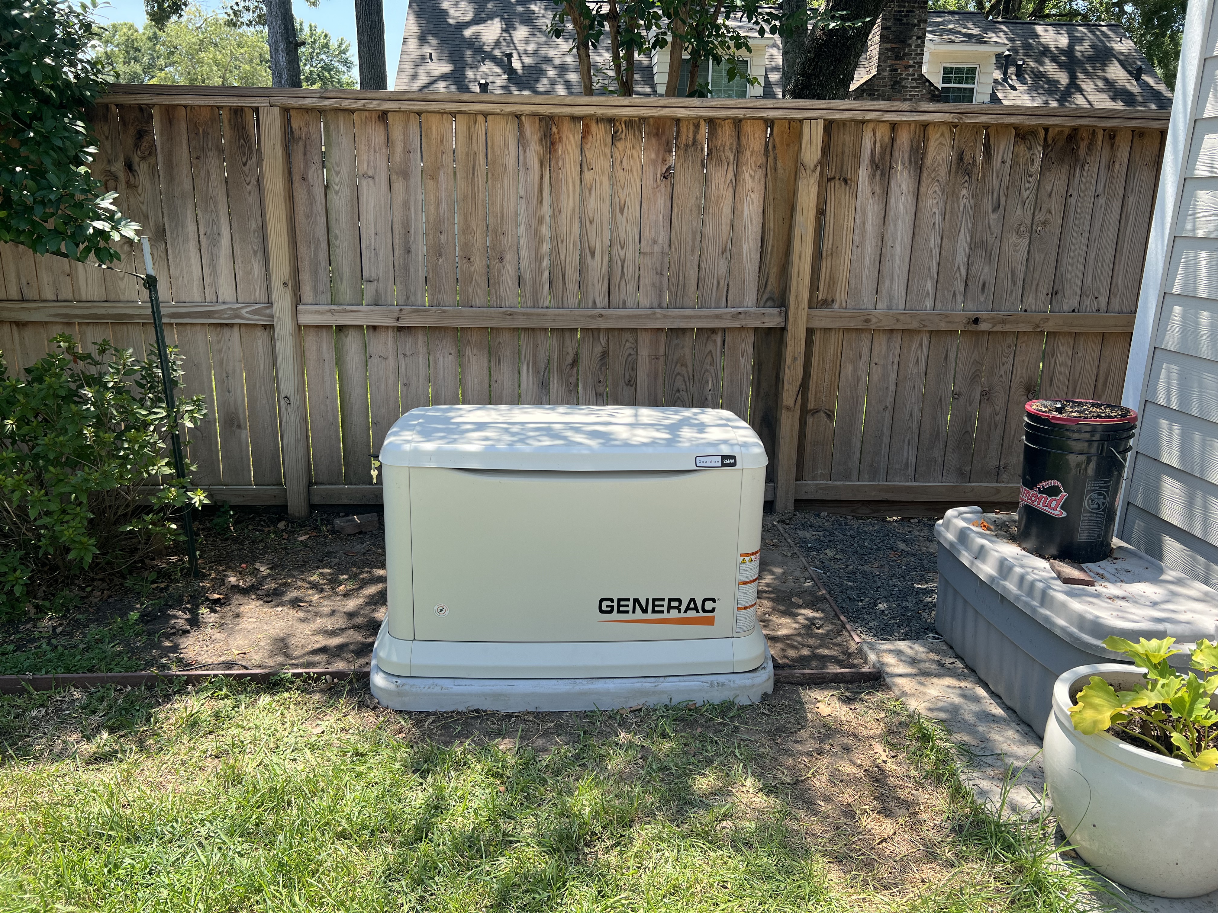 Generac whole-house standby generator installed in a Houston backyard by RBG Services