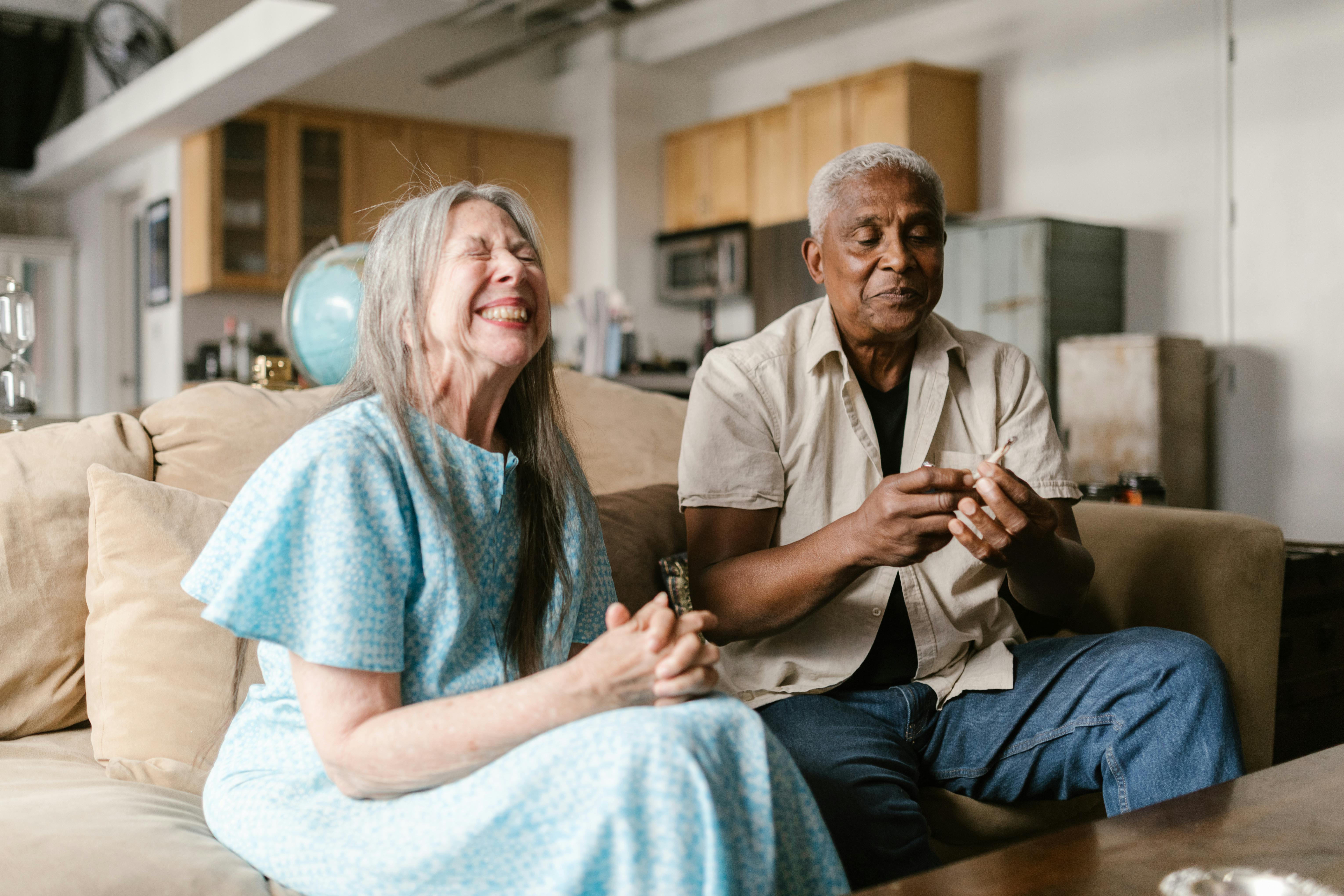 “Caregiver assisting senior woman with medication at home, elderly patient receiving support and companionship in a comfortable living room setting.” “Caregiver assisting senior woman with medication at home, elderly patient receiving support and companionship in a comfortable living room setting.”
