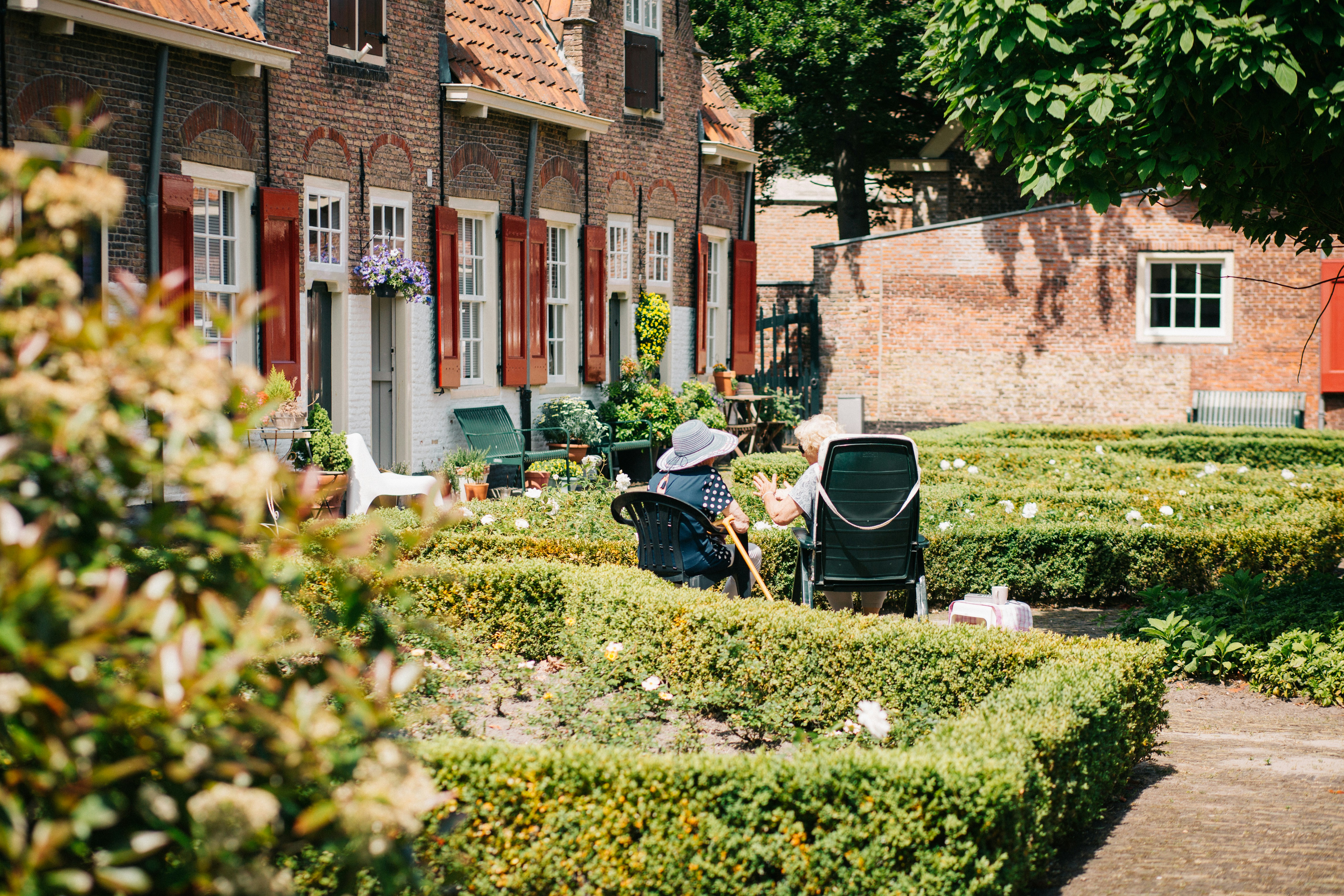 Two elderly people talking outside Two elderly people talking outside