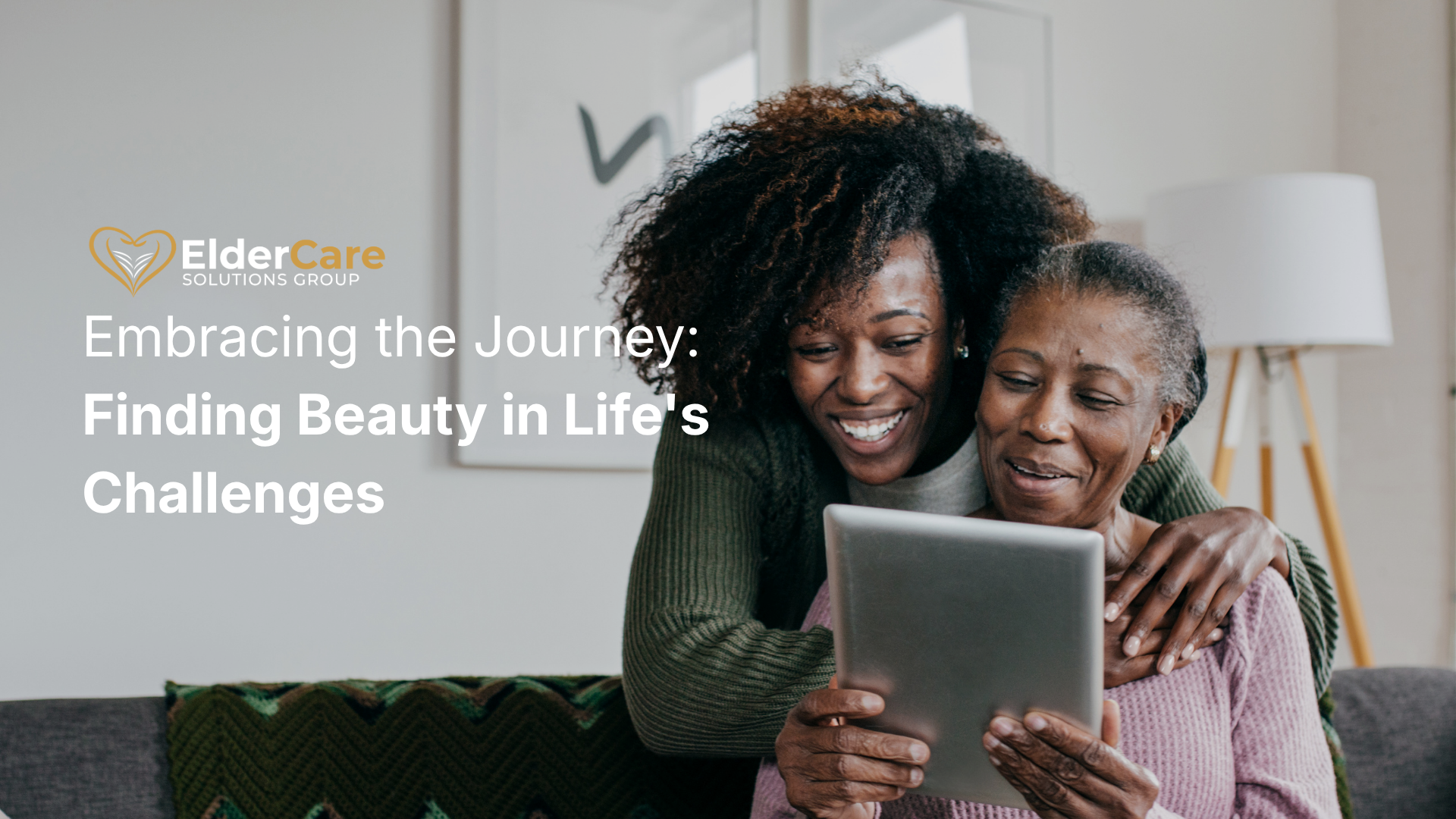 Smiling elderly woman and caregiver using a tablet at home, representing connection, support, and positive aging in senior care