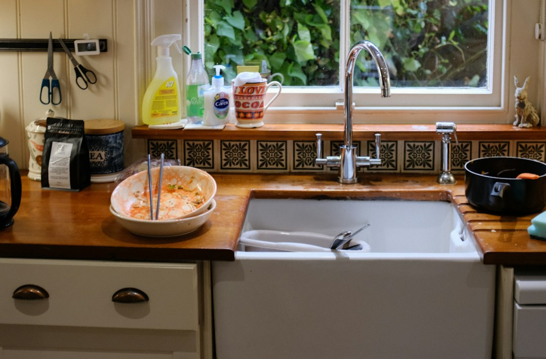 kitchen counter with a few dirty dishes