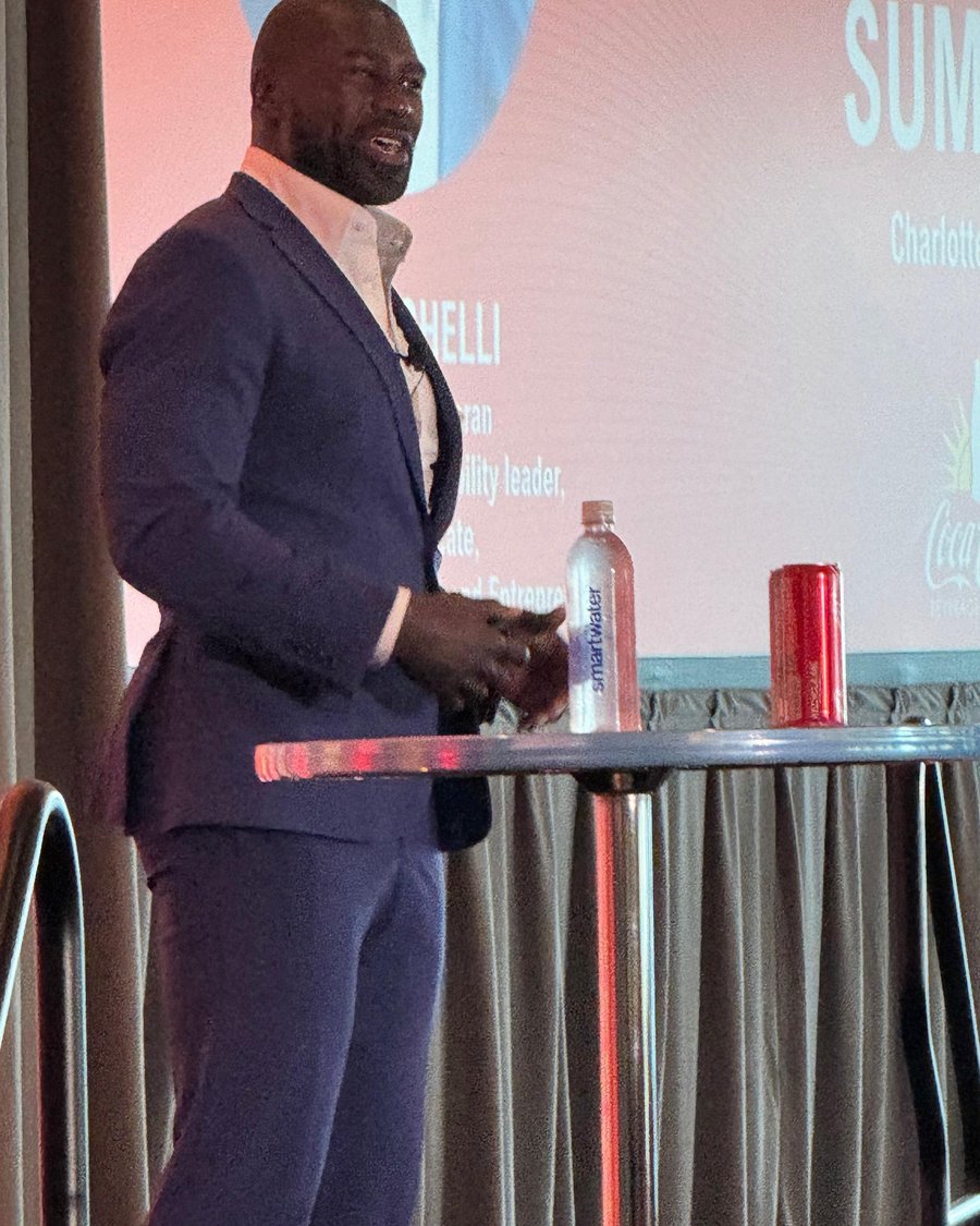 Ovie Mughelli speaking at a summit