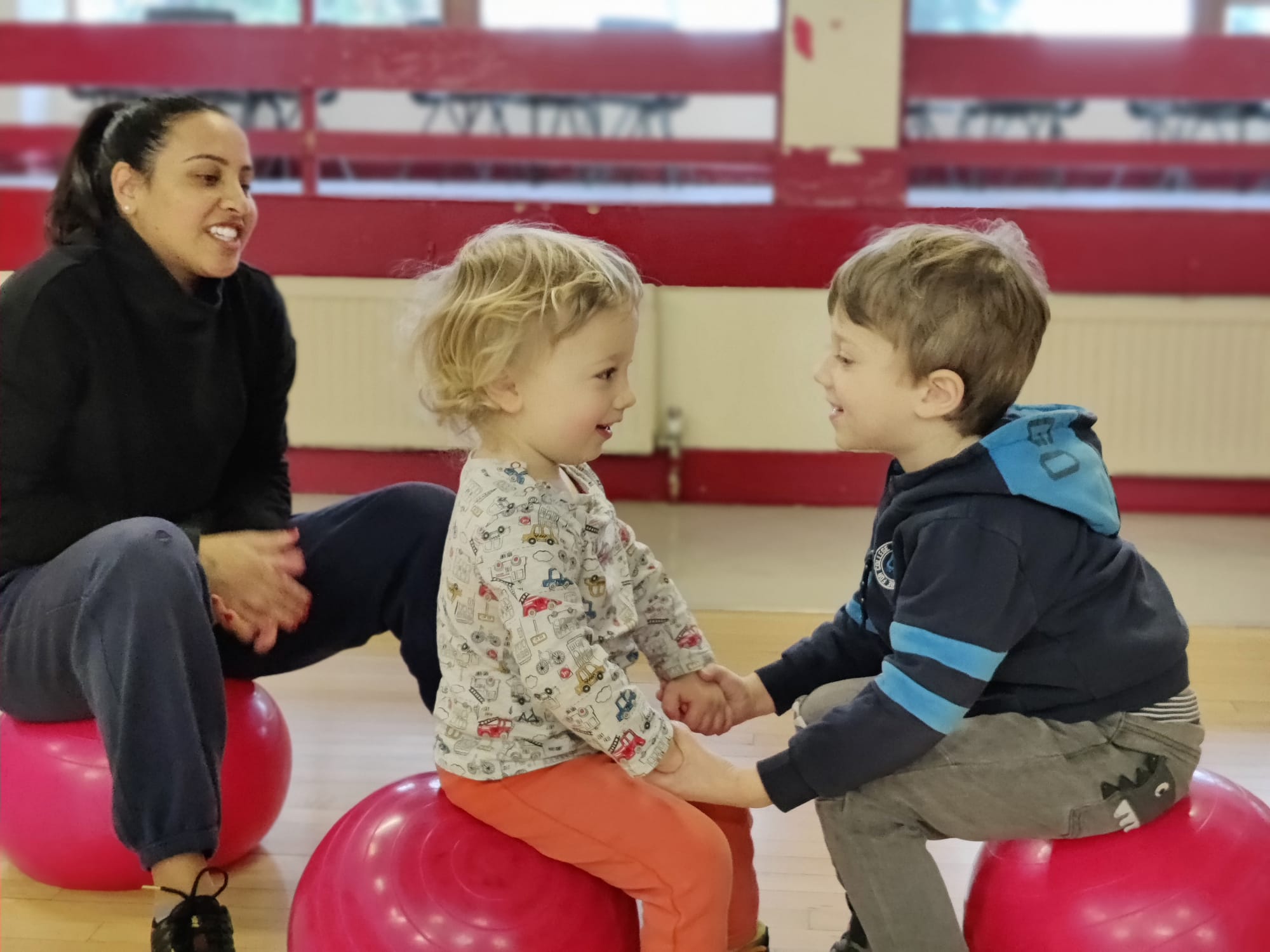 School-age children playing a ball sport together at a Mad4Sports weekly class