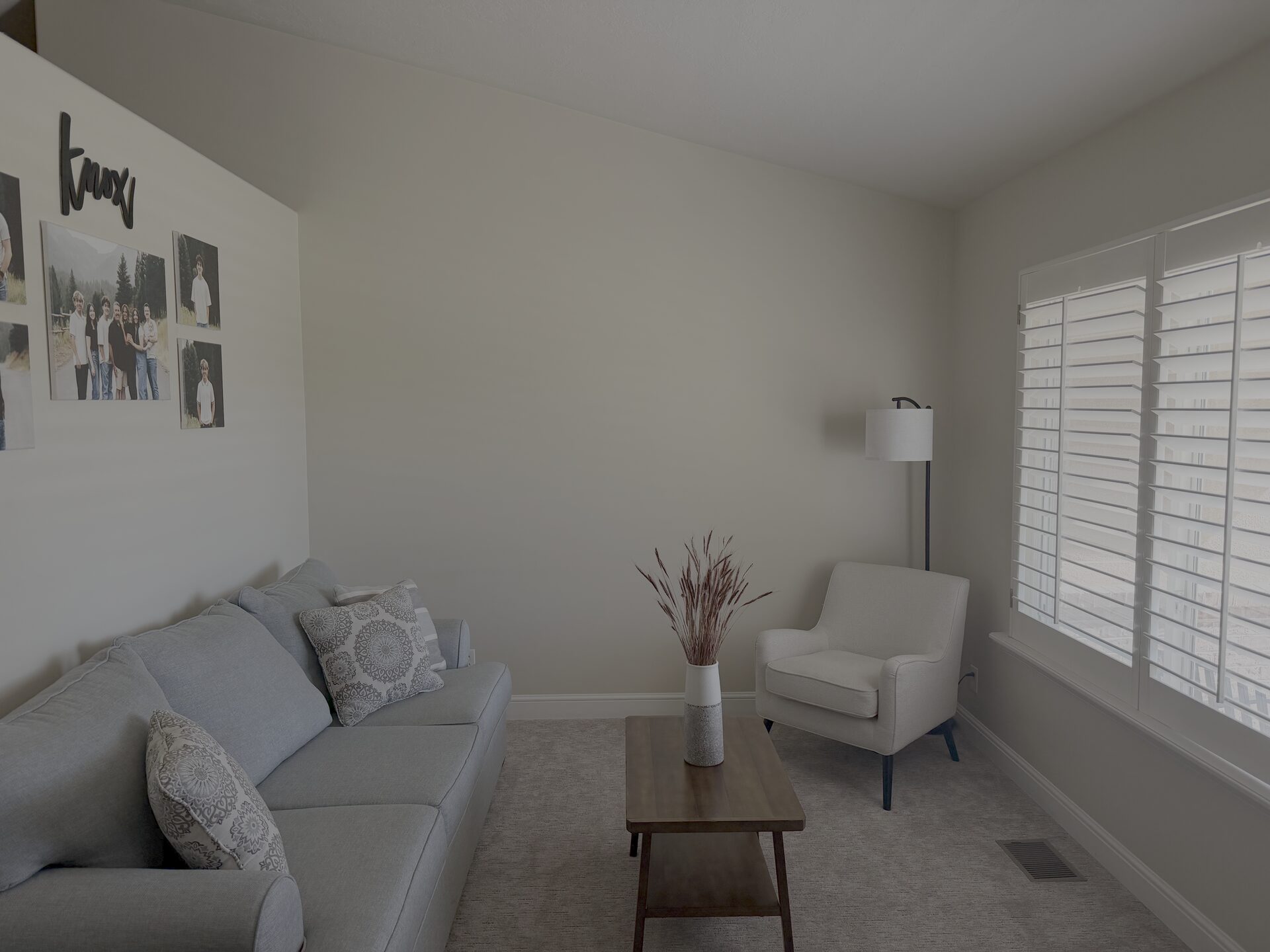 Front sitting room with plantation shutters