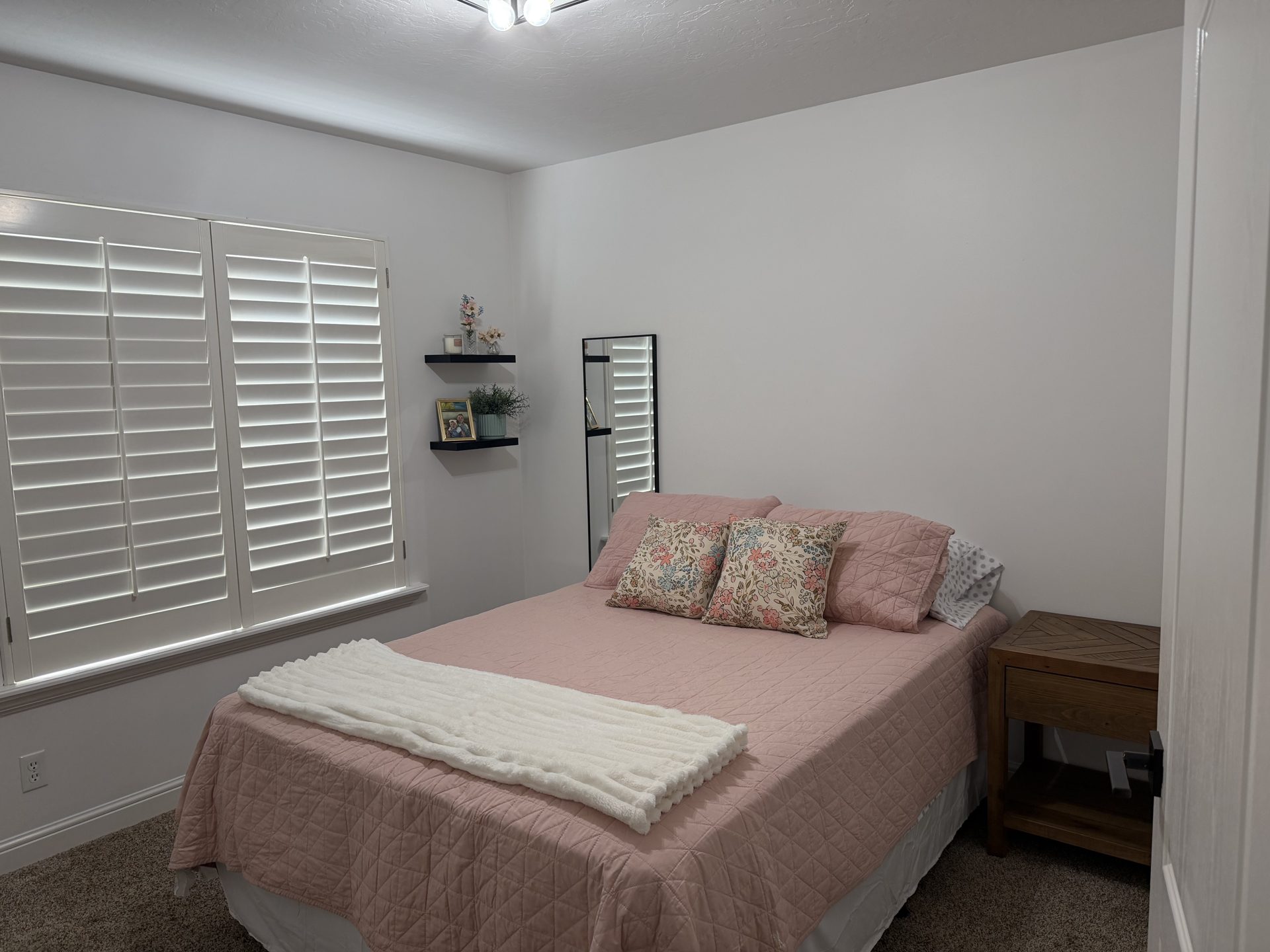 Bedroom with plantation shutters