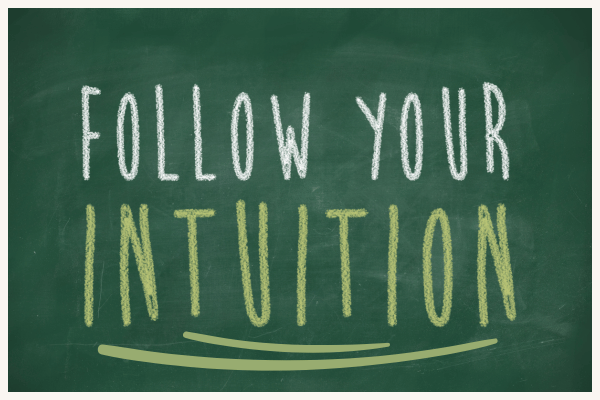 sign that says follow your intuition