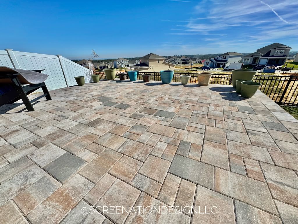 Pavers and travertine by Screenation Design in Kissimmee FL