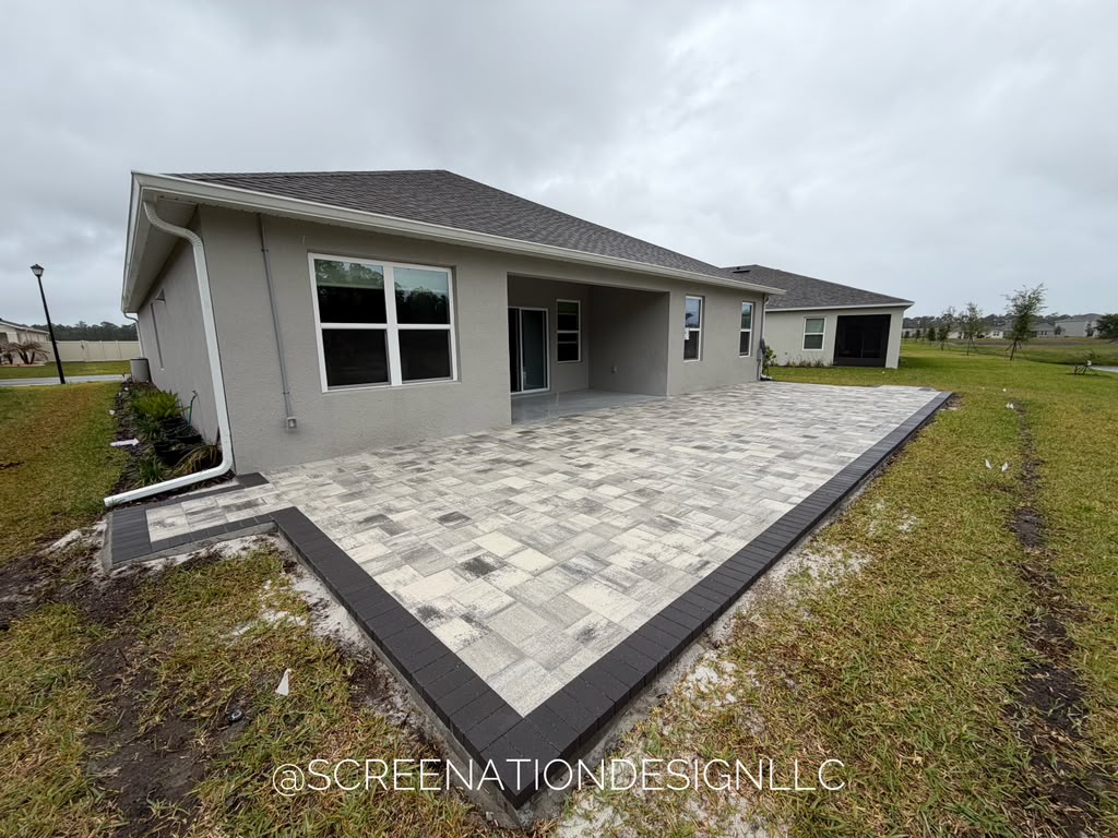 Concrete and travertine by Screenation Design in Kissimmee FL