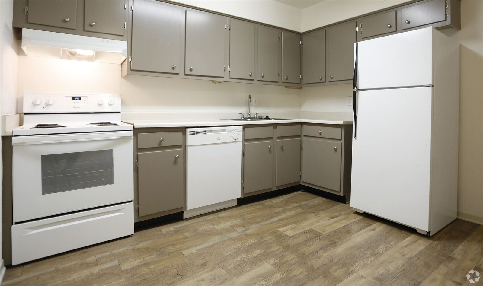 Unfurnished two-bedroom kitchen with white appliances