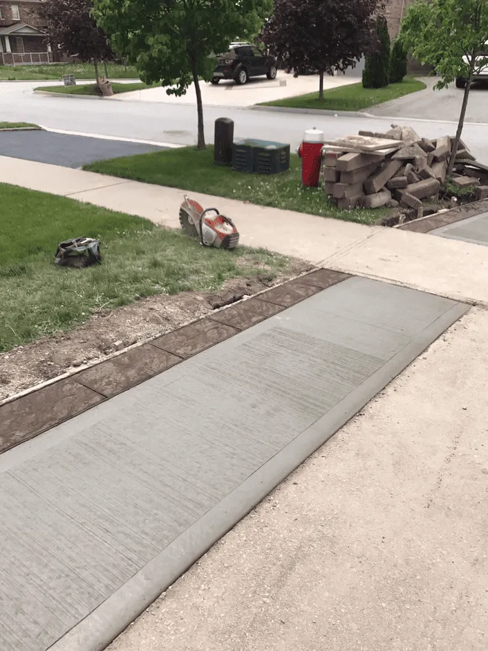 Straight plain concrete walkway and sidewalk