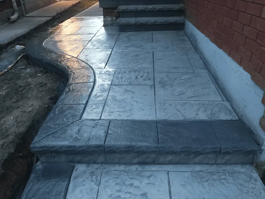 Stamped concrete entrance during finishing