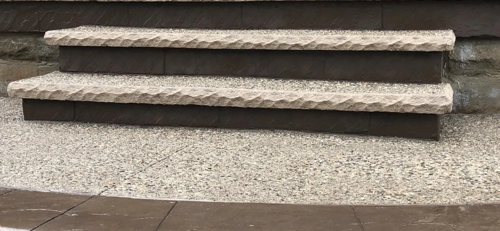 Exposed aggregate concrete steps with clean straight edges