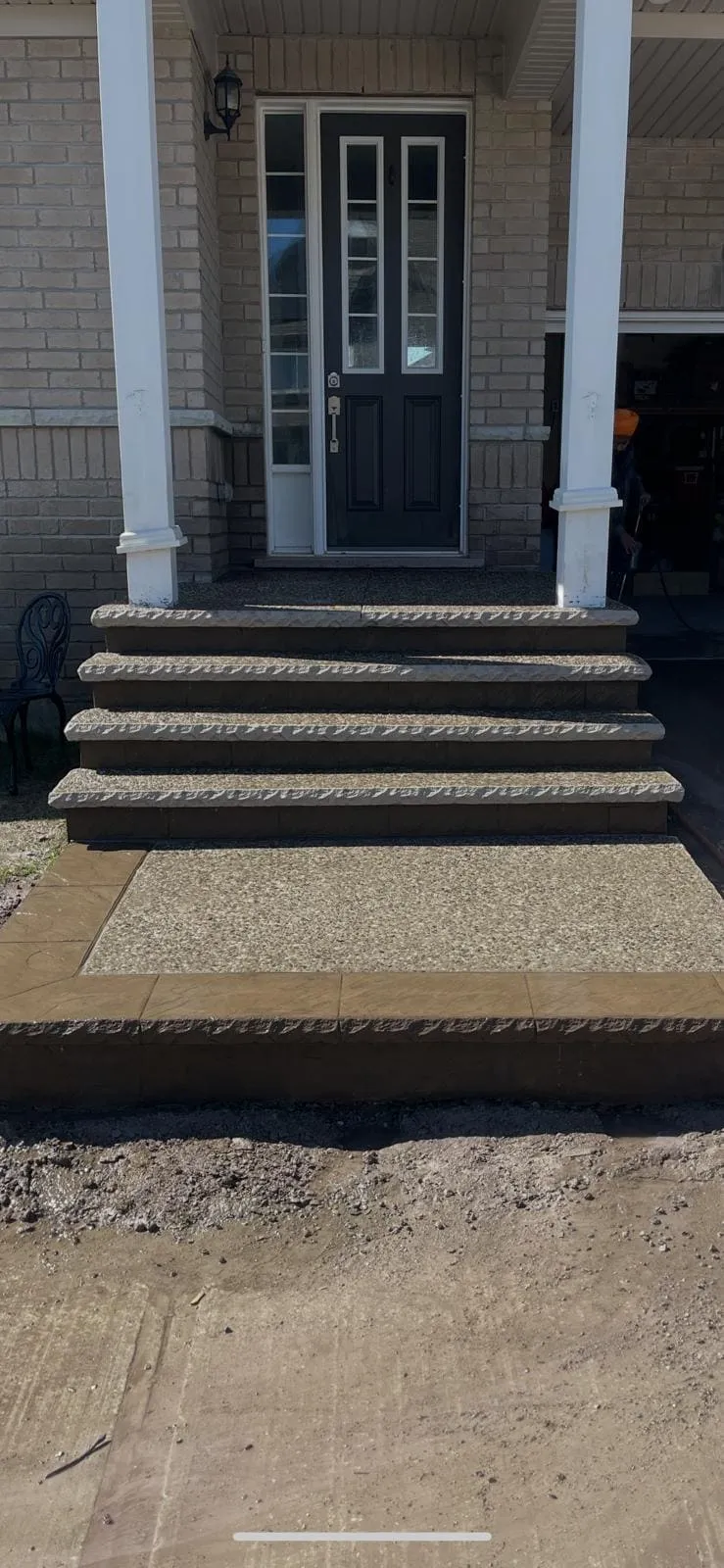 Straight exposed aggregate front steps and landing