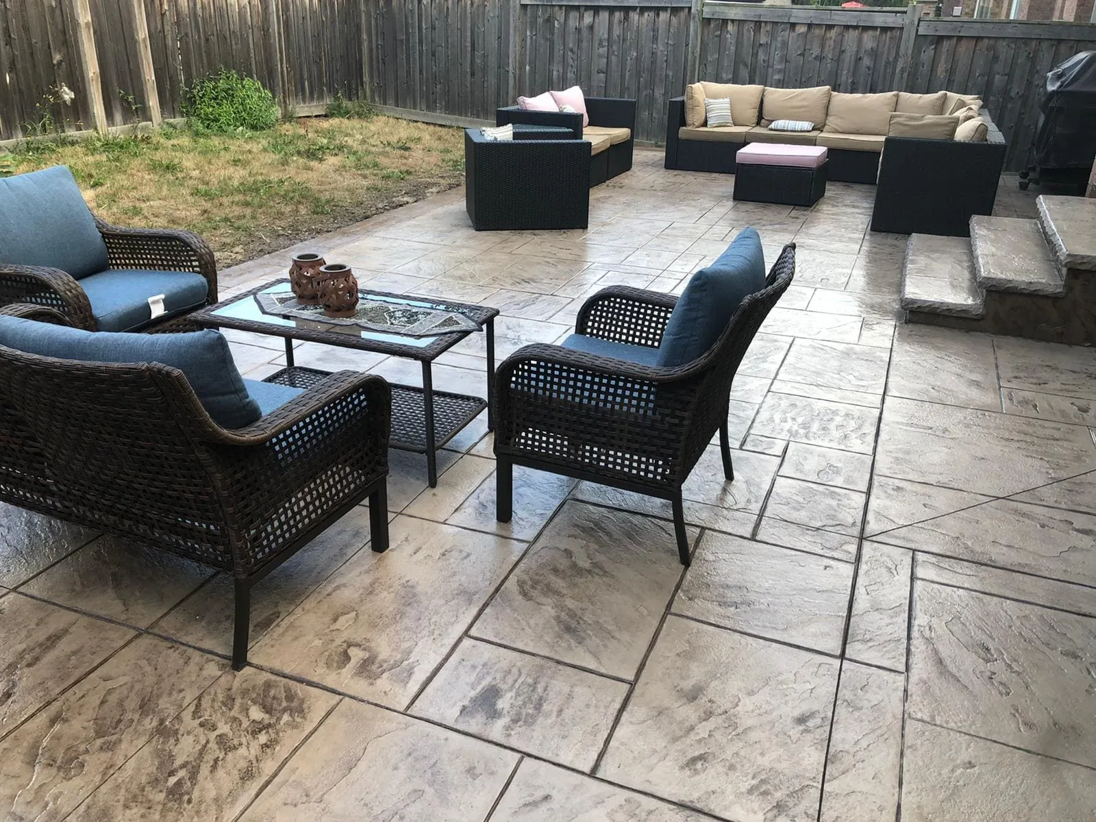 Furnished stamped concrete backyard patio