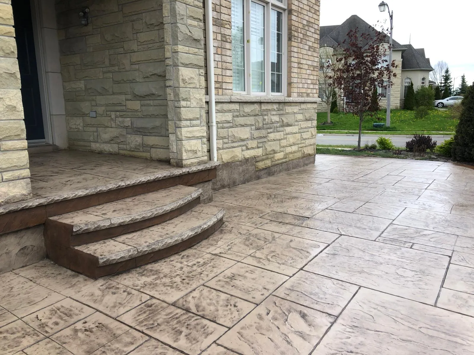 Finished stamped concrete patio and entrance