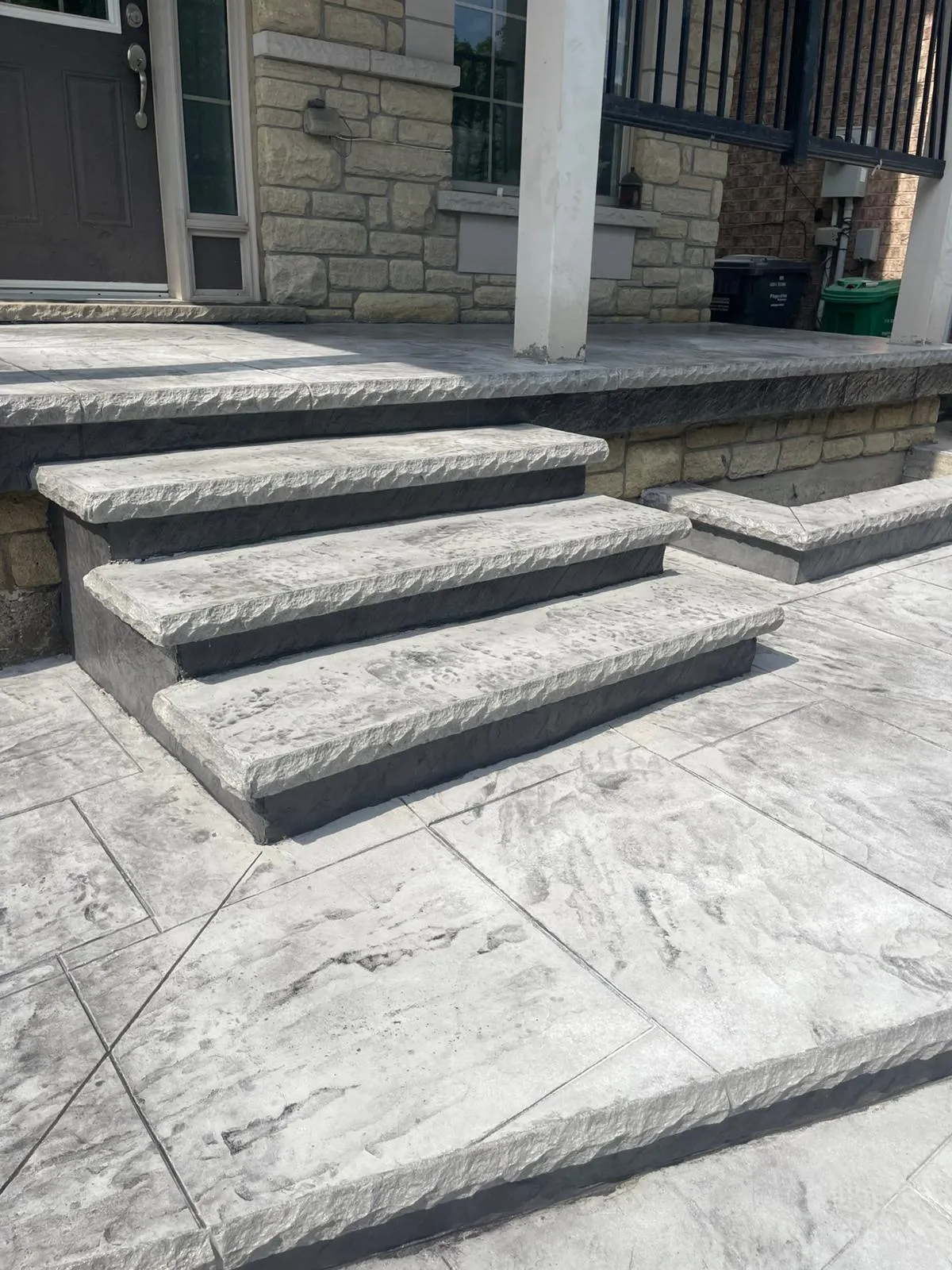 Tall view of stamped concrete front steps