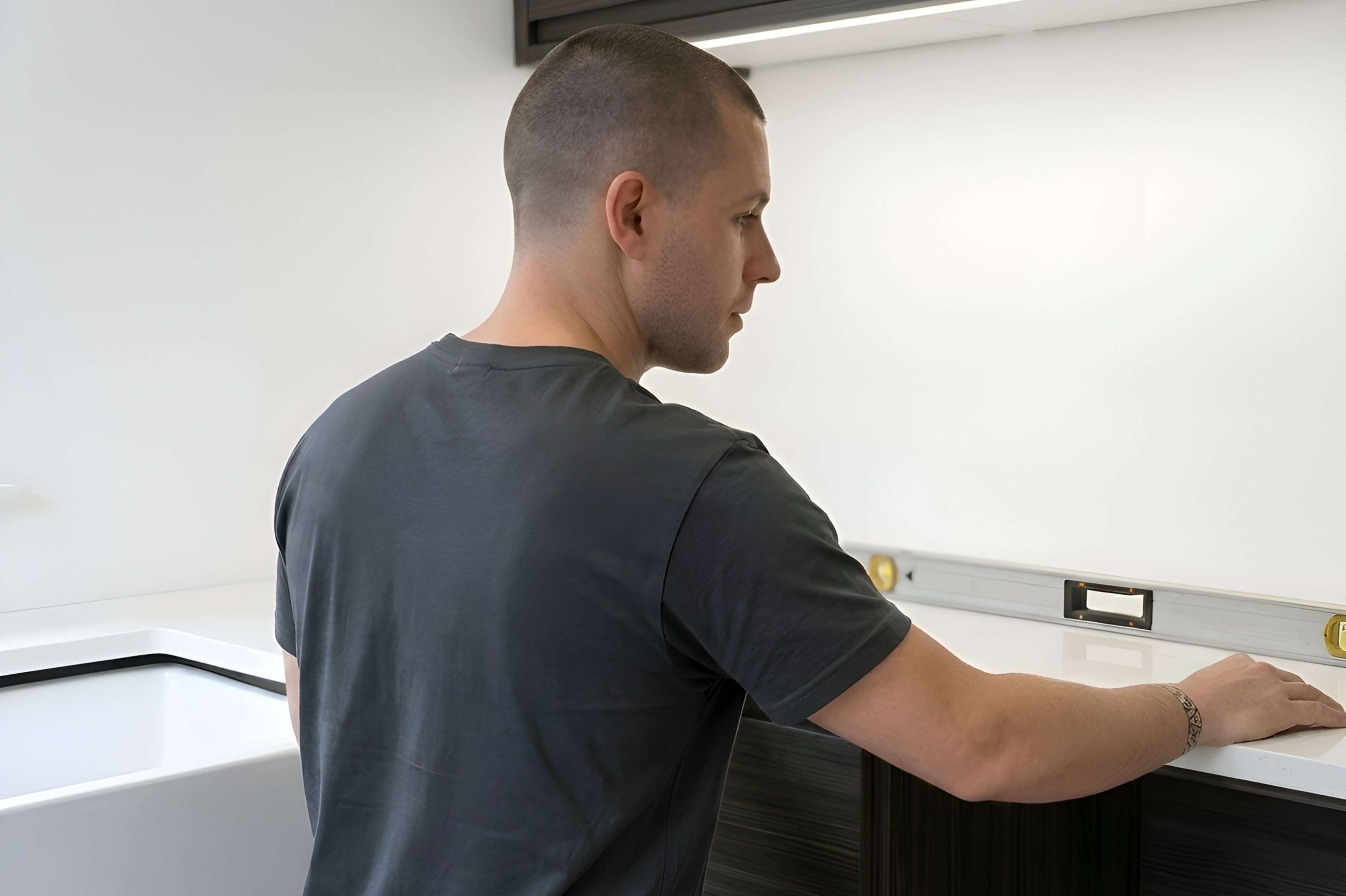Installer fitting a worktop