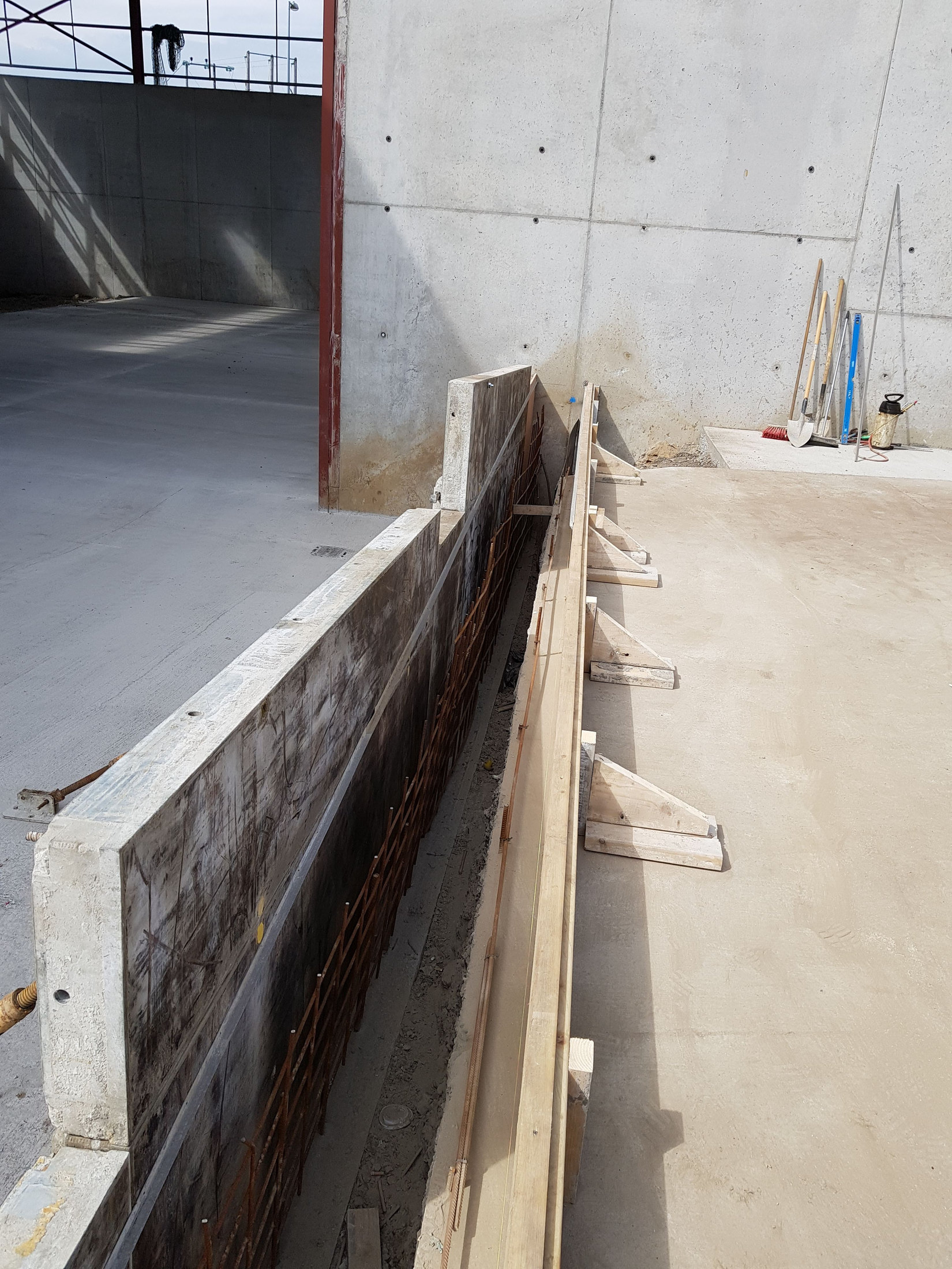 Shuttered concrete wall during construction