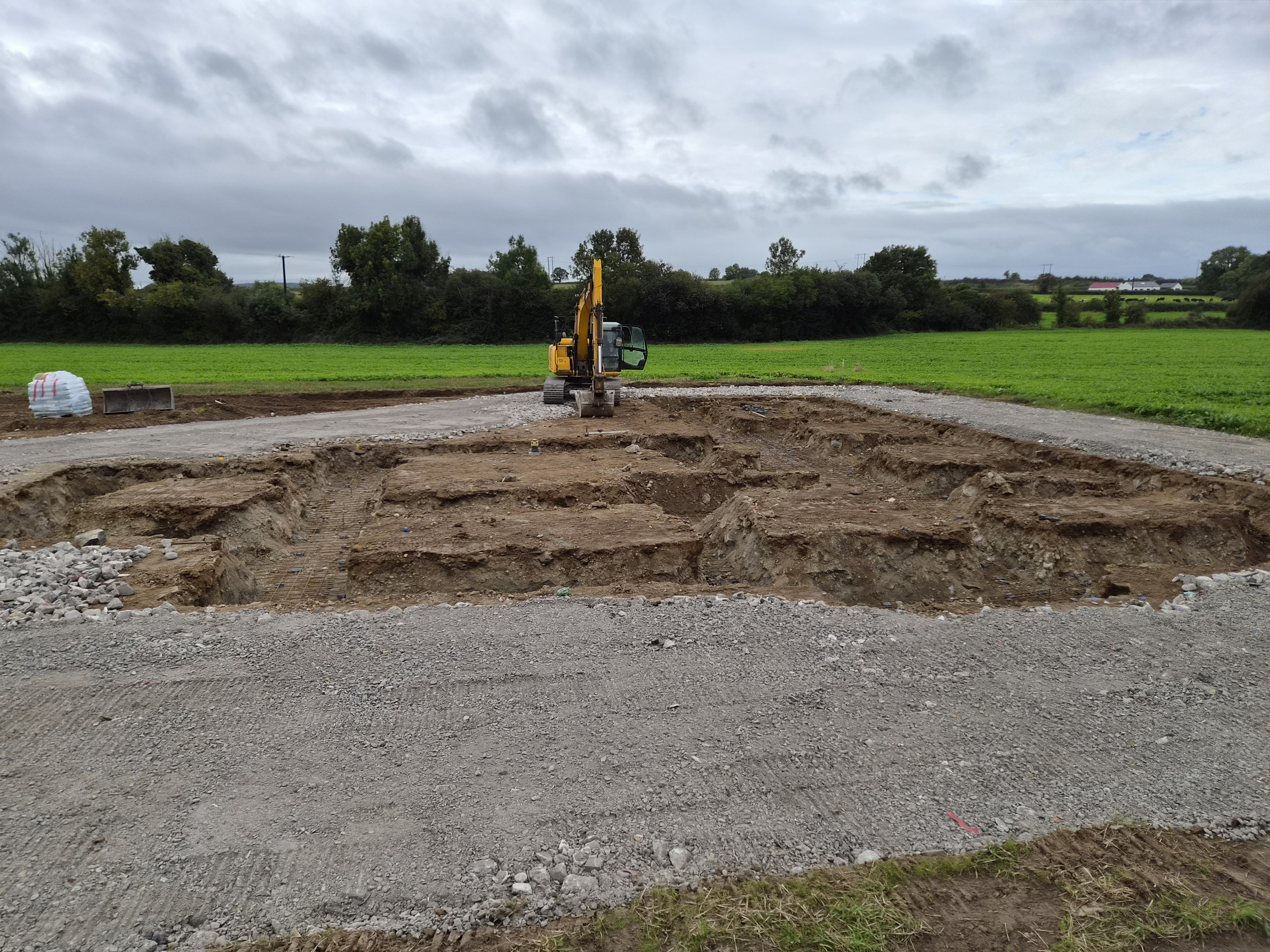 Groundworks excavations with excavator on site