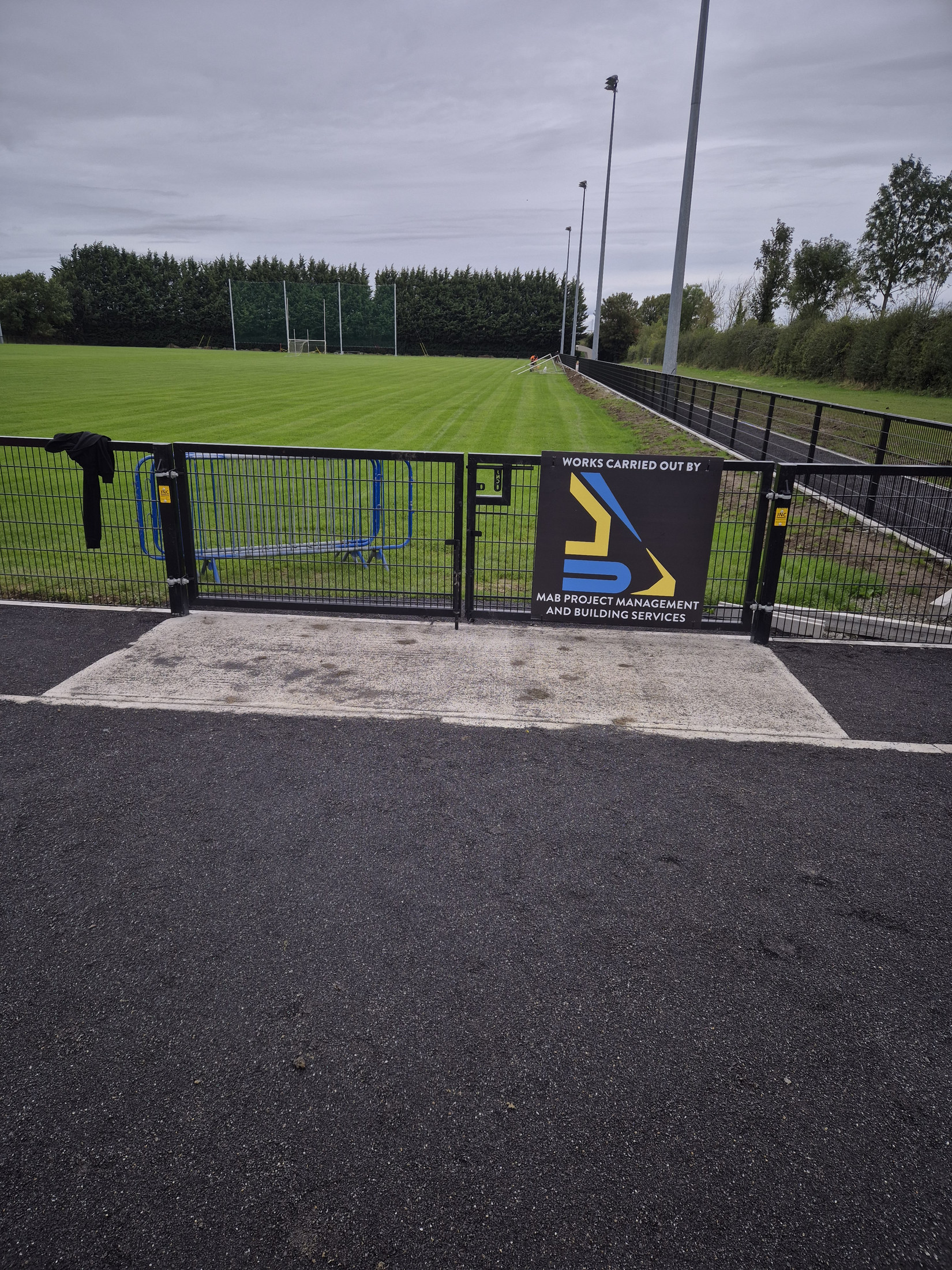 Main gate and finished perimeter path