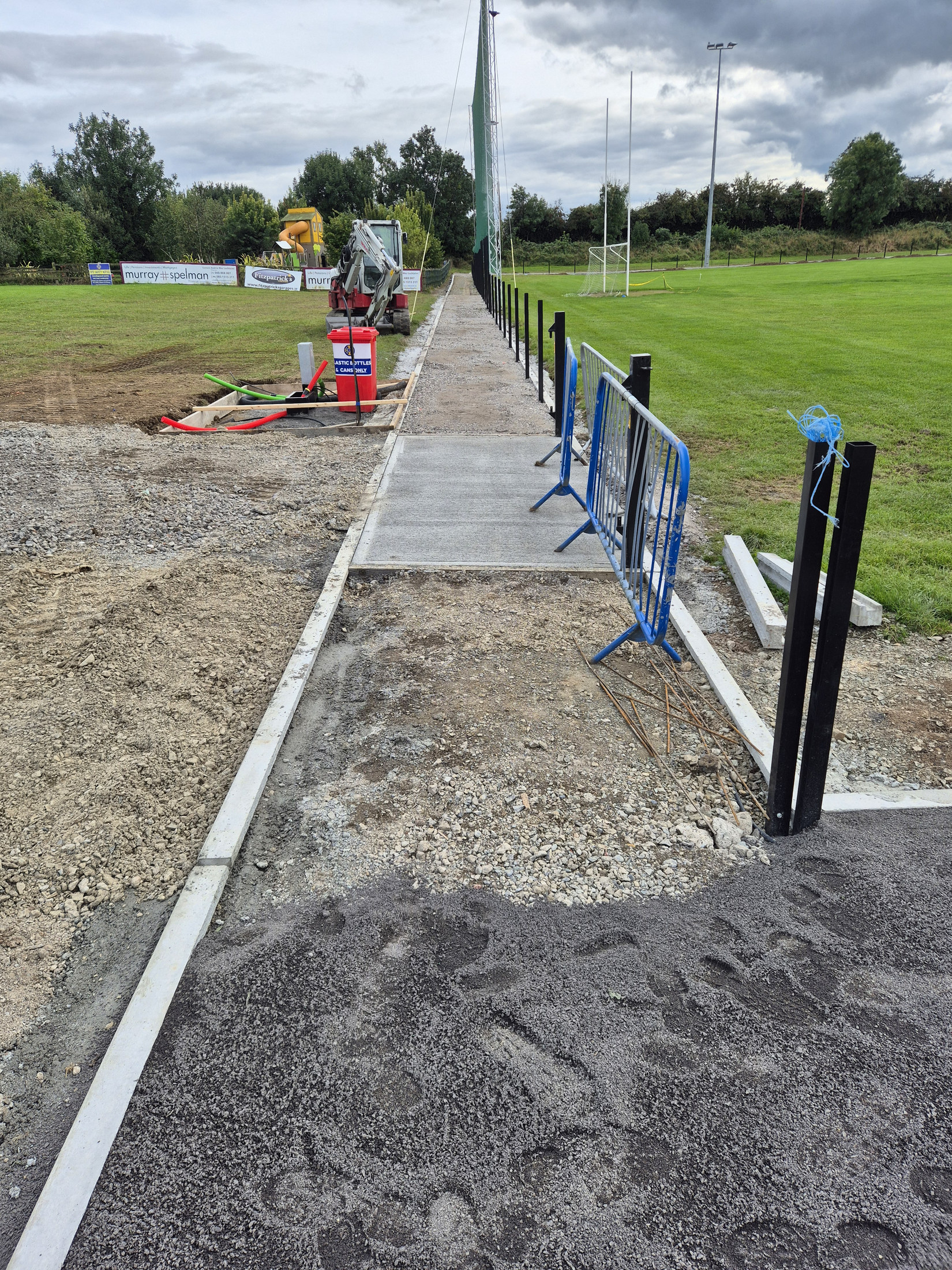 Concrete path installation in progress