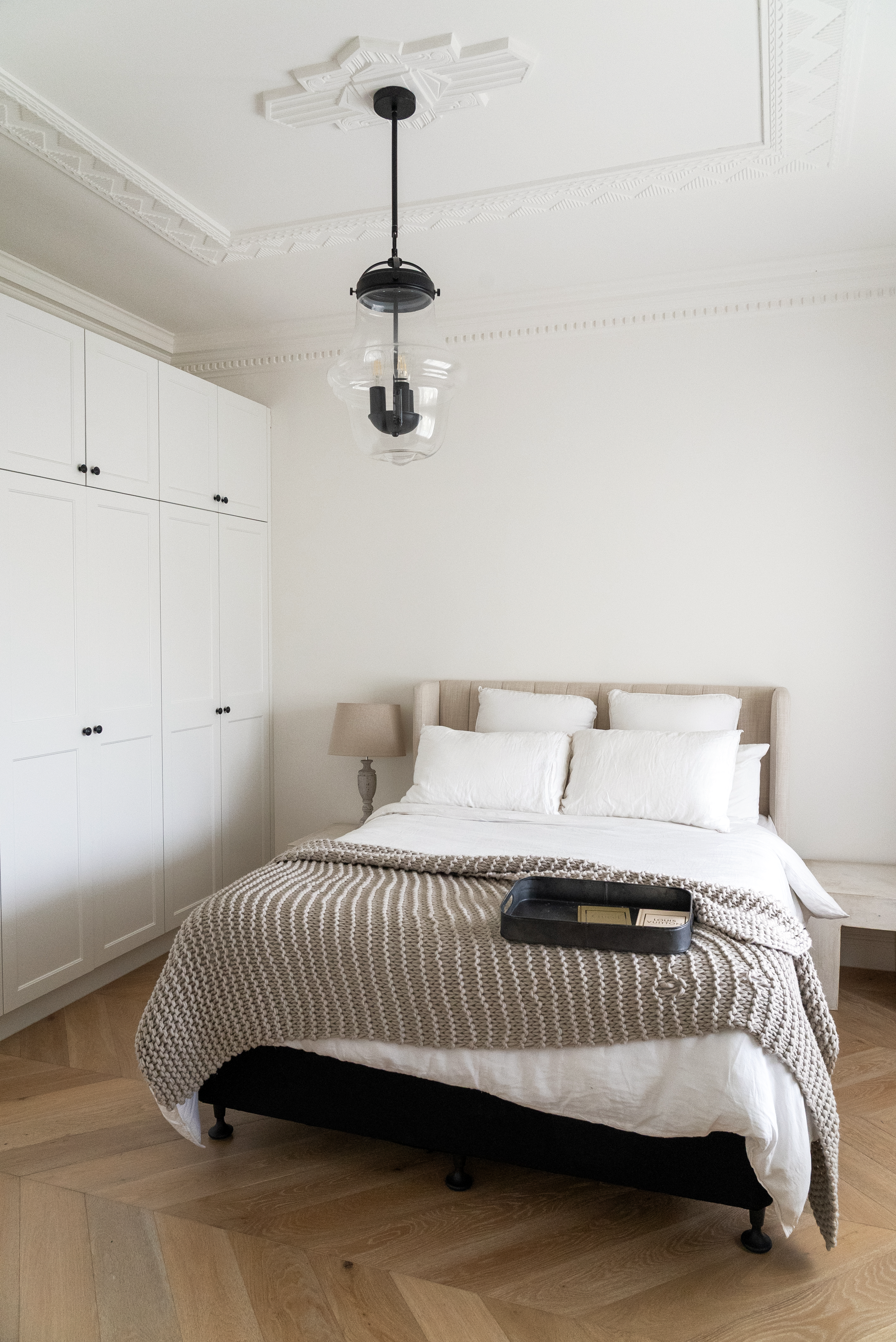 Master bedroom renovation Melbourne with soft lighting and refined finishes