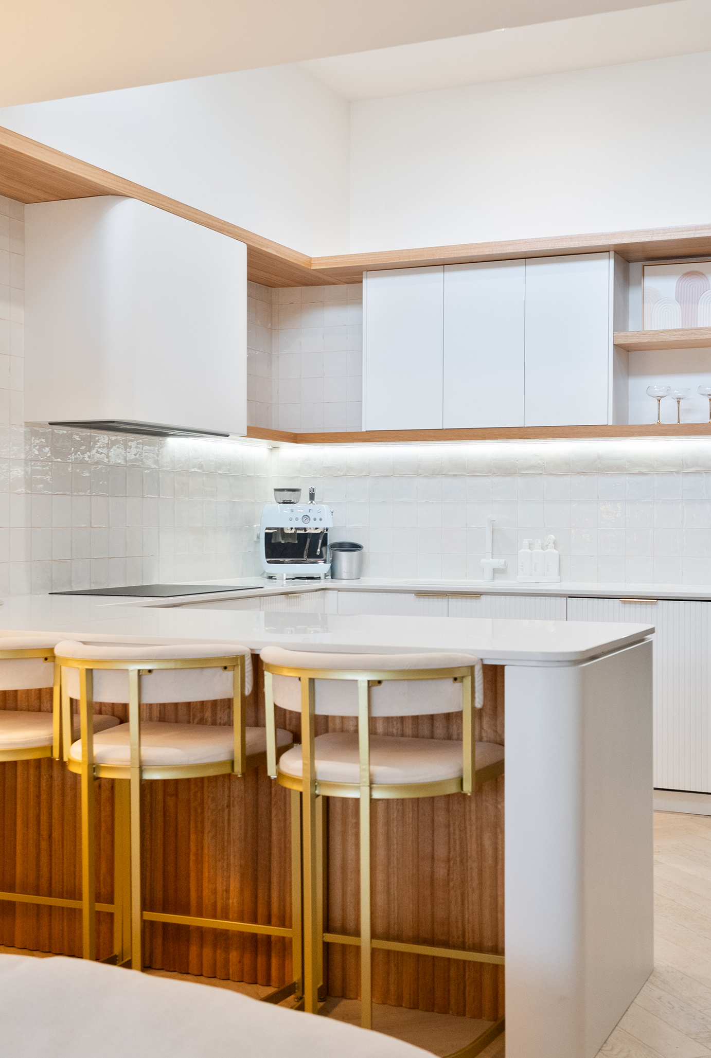 Modern Port Melbourne kitchen with island bench and timber accents.