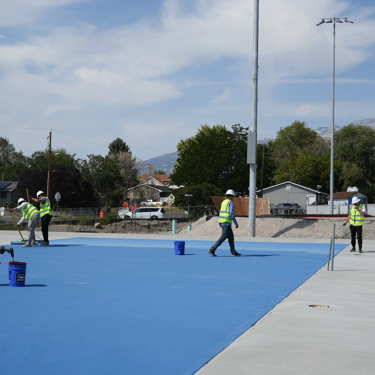 ace coatings nc east working on a pickleball court installation in Wilmington NC ace coatings nc east working on a pickleball court installation in Wilmington NC
