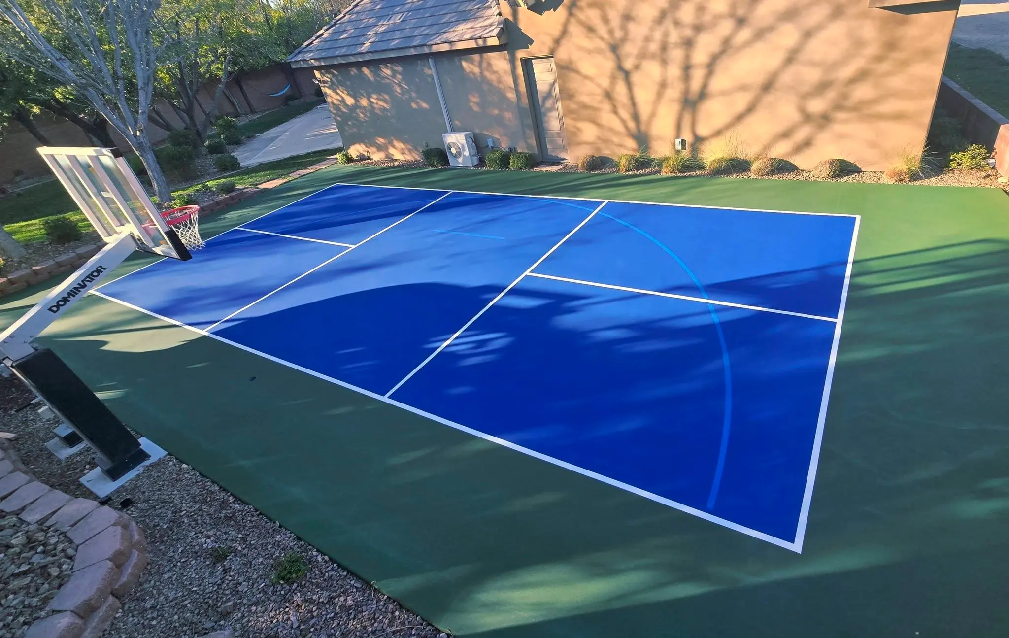 image of a backyard pickleball court image of a backyard pickleball court