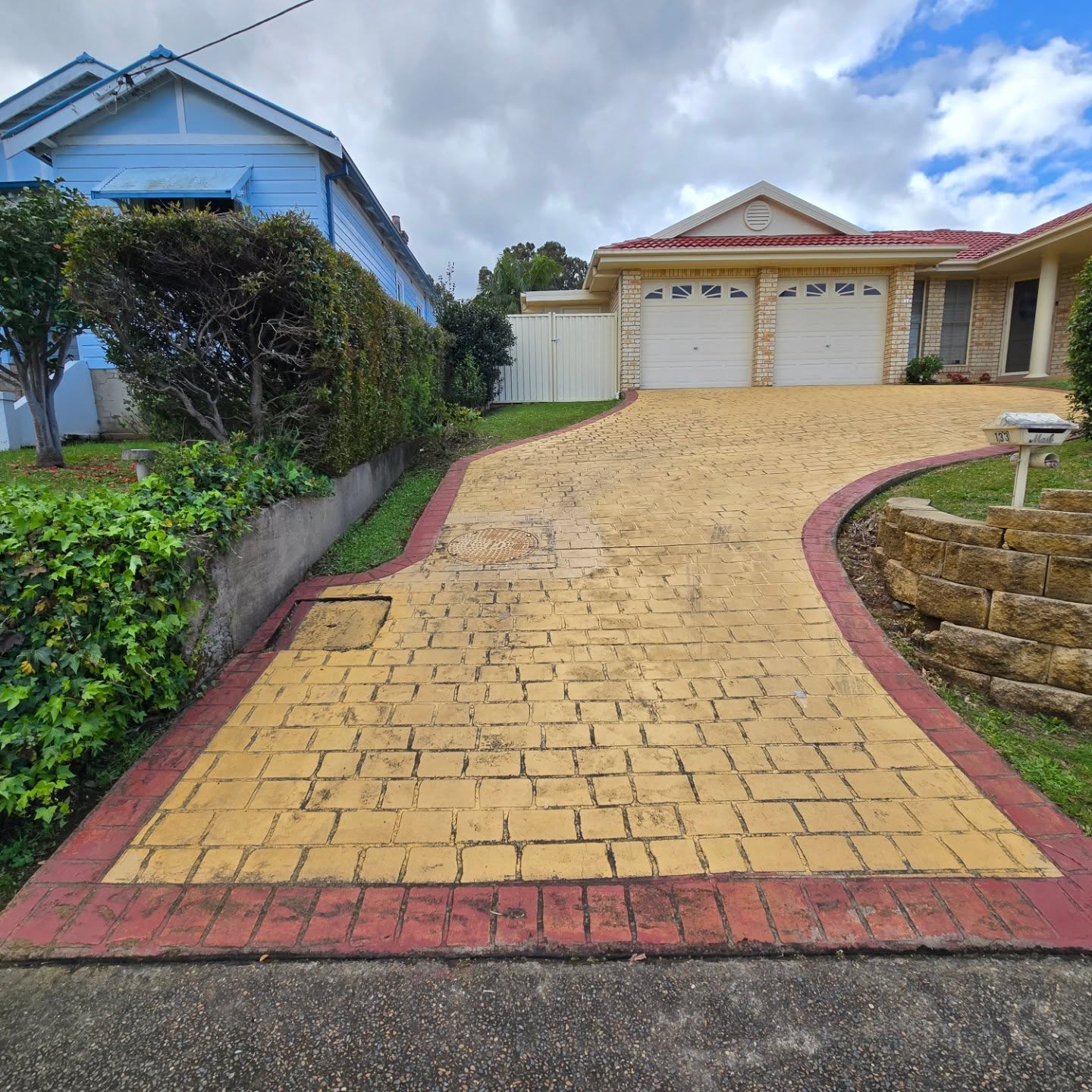 Brick Red Driveway Refresh with Non-Slip Finish - Image 1