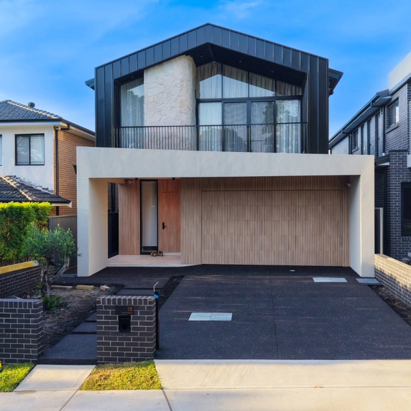 Jet Black Concrete with a Sandy Beige Fleck Finish - Image 1