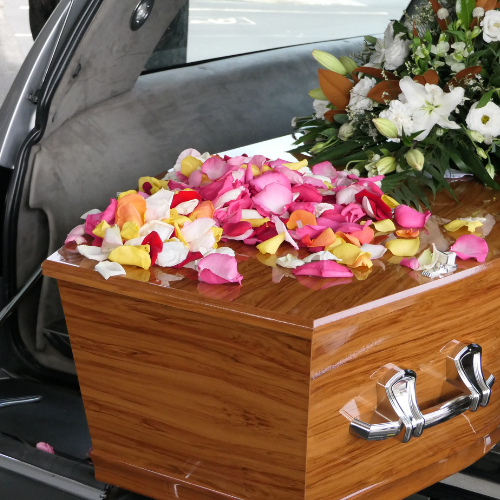 casket loaded into hearse, we help with removals and state-to-state transports