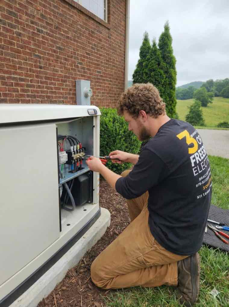 3 Or Free Electric technician installing a standby generator in Hendersonville, TN