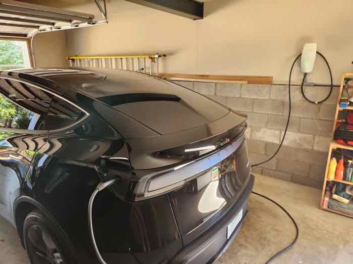 Level 2 EV charger installation in a Hendersonville, TN garage by Three Or Free Electric